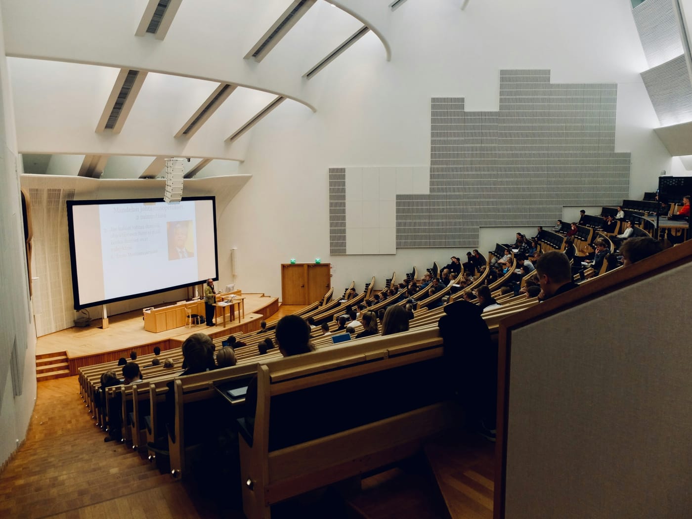 Students in a university lecture hall.